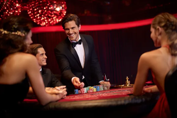 A confident dealer surrounded by casino chips inviting players to access their JLWAFA account, reflecting quick and easy login options.