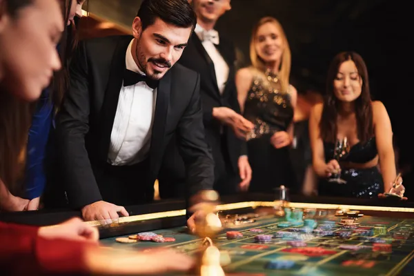 A person using their device against a moody casino-themed background, illustrating the smooth re-entry process at JLWAFA.